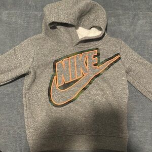 Nike Gray Sweatshirt with Iconic Swoosh Design